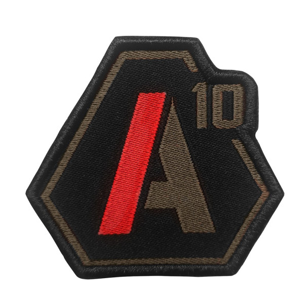 Patch A10 brodé vert olive/rouge sur tissu noir A10 Equipment
